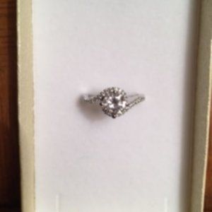 Silver plated engagement ring.  Size 6.